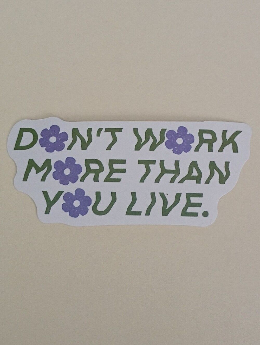 10/$10 Sticker - Don't Work More Than You Live - Green Text & Purple Flower O's